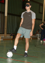 Foto eines Spielers mit Trainer